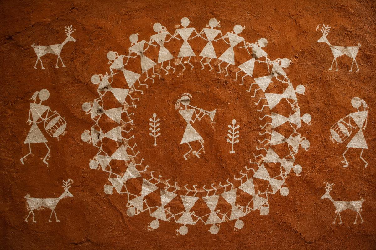 Warli painting of a circular Tarpa dance